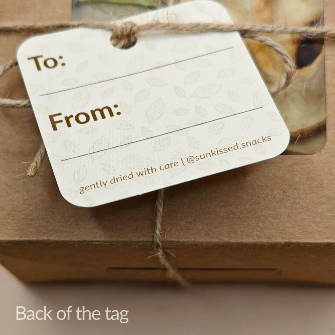 Back of gift tag showing ‘To:’ and ‘From:’ lines on a kraft box