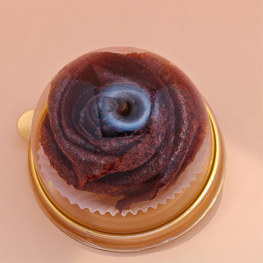 pastila in rose in dome package on a peach background